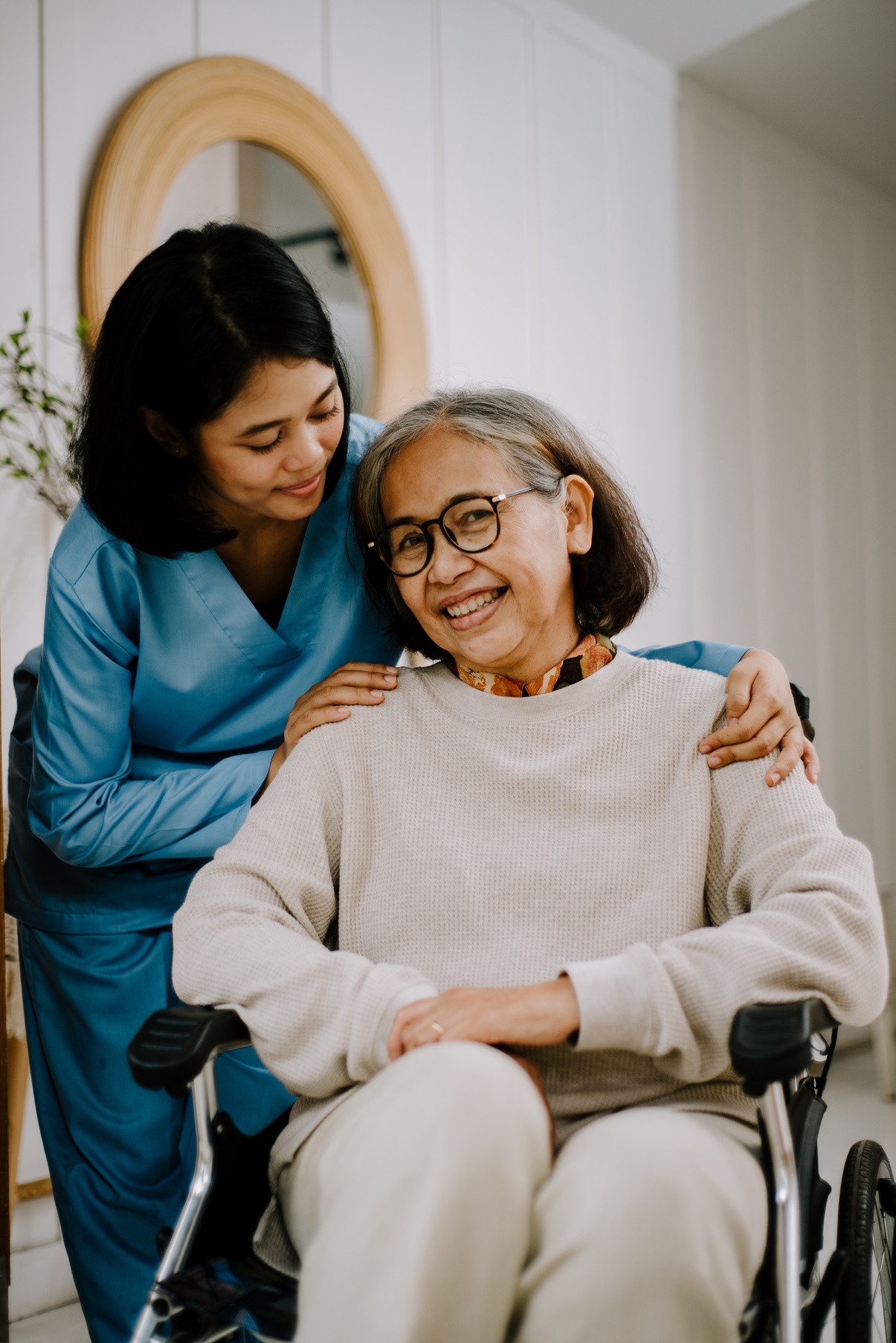 Caregiver supporting an older patient